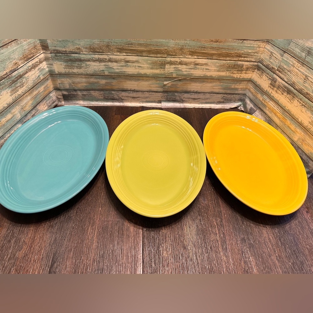 Set of 3 like new fiesta ware 13 inch platters.